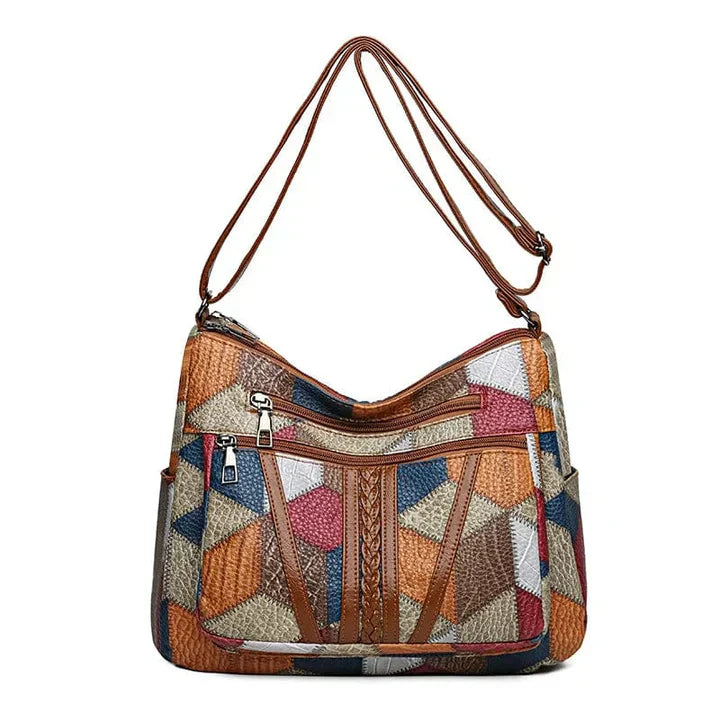 Bolso de mano de piel con mosaico